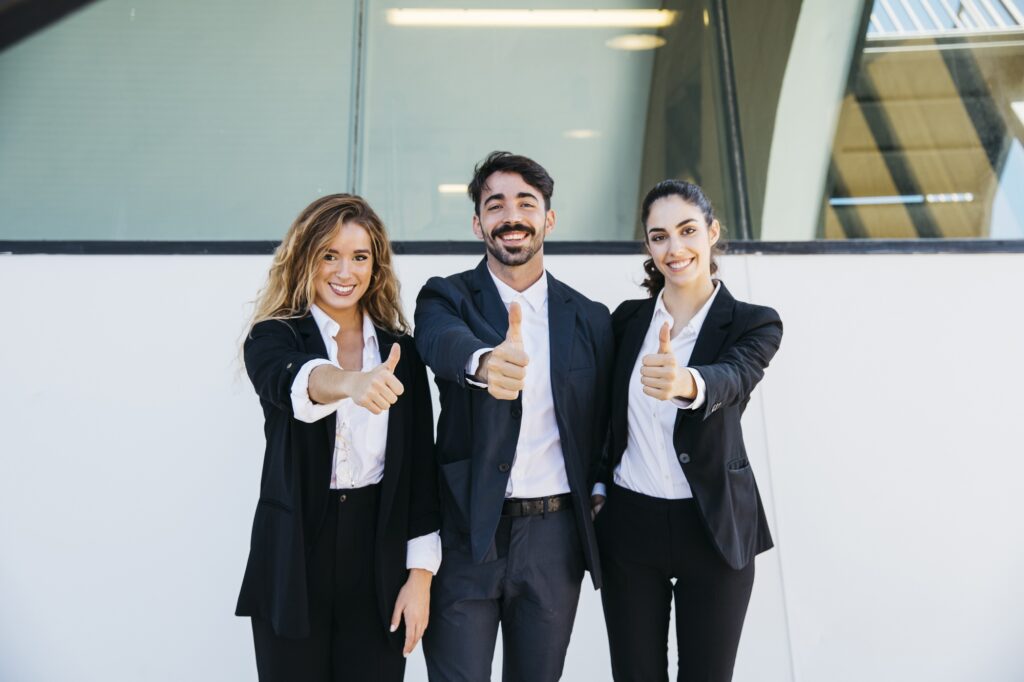business-people-making-thumbs-up-gesture
